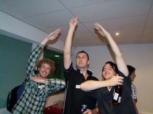 Not content with their already tall statures, Simon, Shanon, and Greg reach for the sky.