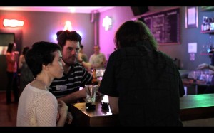 I presume that Heidi is officiating a staring competition between James and Greg.